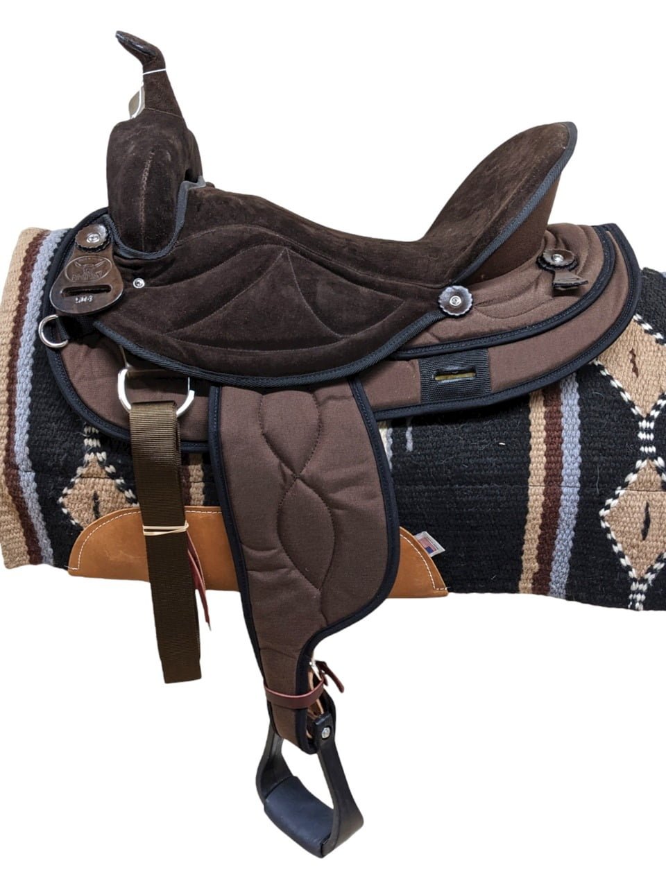 This exquisitely designed synthetic saddle showcases a rich, all-brown hue accented with black binding. The Big Horn synthetic model is characterized by a 5" cantle, and its seat is adorned with padded suede that extends seamlessly to the jockeys. Ensuring optimal tie functionality for your horse, a 7/8 position single front stainless steel dee is incorporated. Remarkably lightweight at 15 lbs, this saddle stands among the lightest options in the western saddle industry. The Ralide® material, coupled with laced suede cushioned foot pads, adds both durability and comfort to this exceptional piece.
