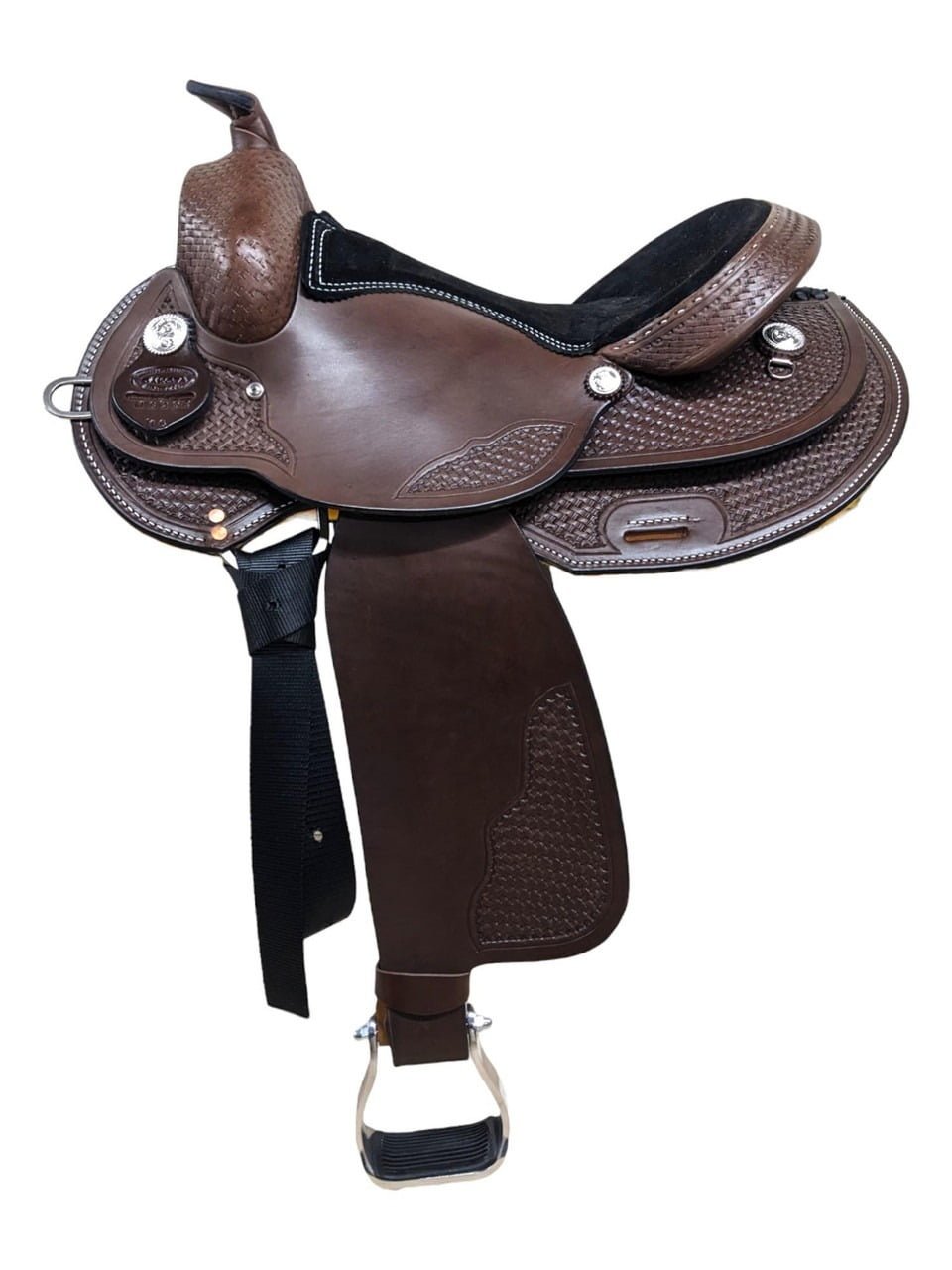 In this stunning Dakota trail-reining combo saddle, you'll be able to spin like a pro in the arena and rock the trails. Smooth leather and a basket stamped tooling complete this saddle. Silver conchos and double, rounded skirts finish the saddle. This skirt style is custom and you cannot find these everywhere! This is the same Dakota reiner you love, but with nice rounded skirts to accommodate for any horse's back. Weight: Approx. 25 lbs Gullet: 7" mid-concho to mid-concho Skirt Length: 26.5" *Due to supply chain issues, leather color and seat color may vary slightly from pictures. Buyers be advised*